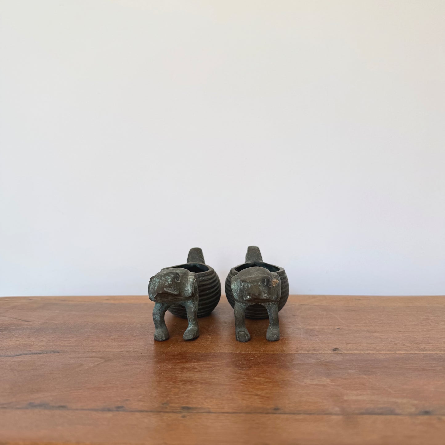 A pair of bronze Frogs Pulling Conch Shell