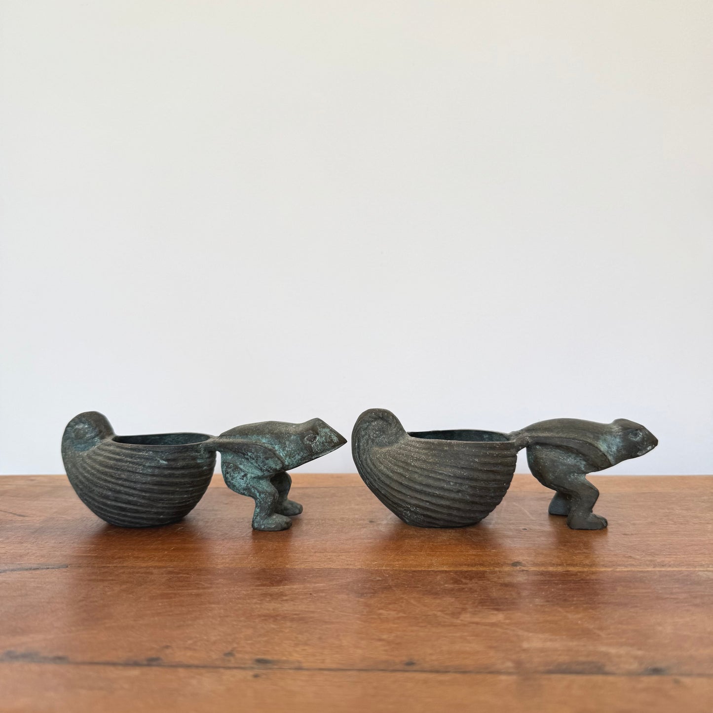 A pair of bronze Frogs Pulling Conch Shell
