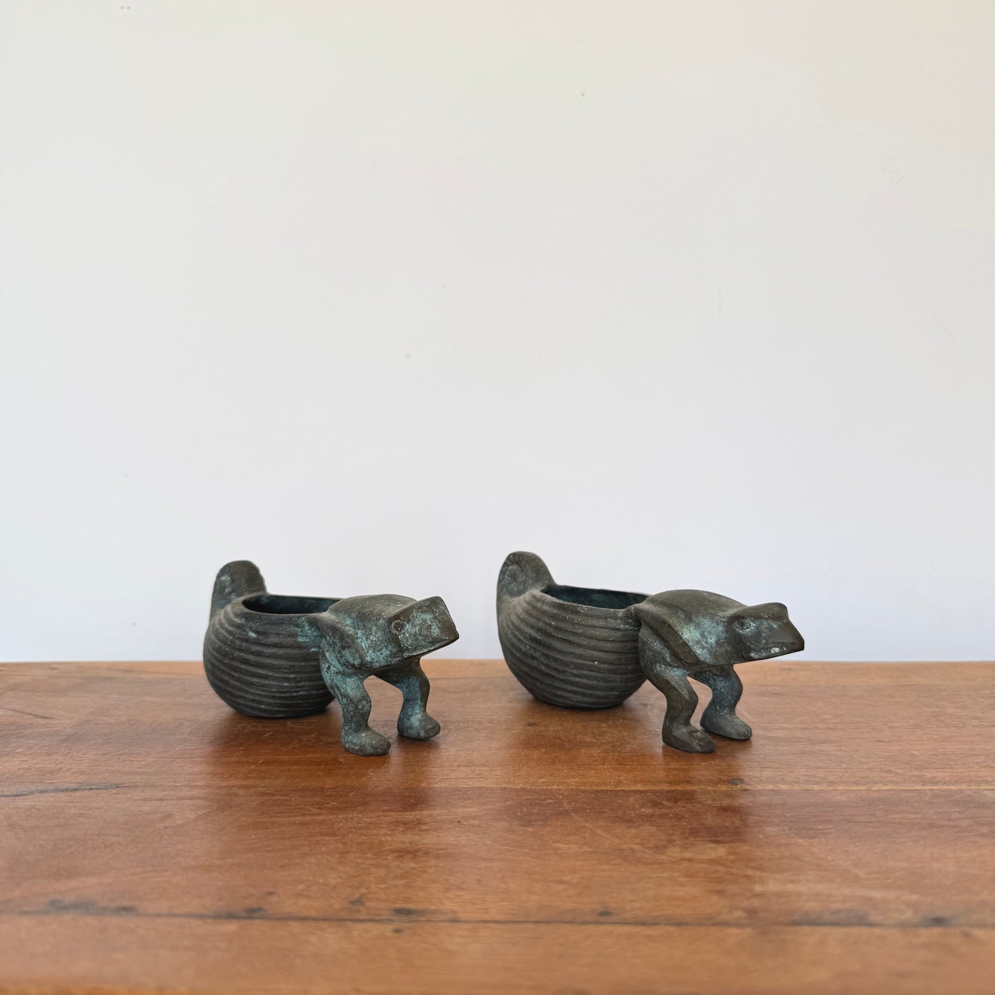 A pair of bronze Frogs Pulling Conch Shell