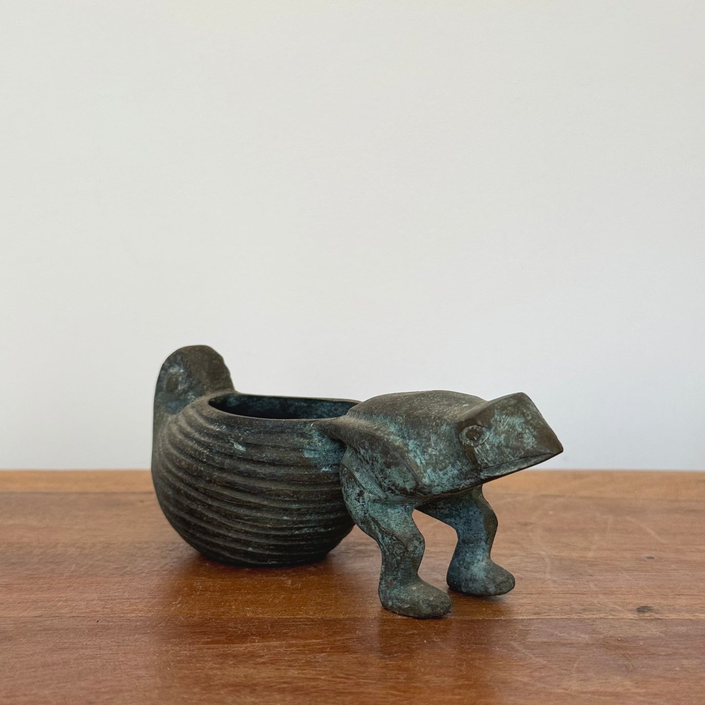 A pair of bronze Frogs Pulling Conch Shell