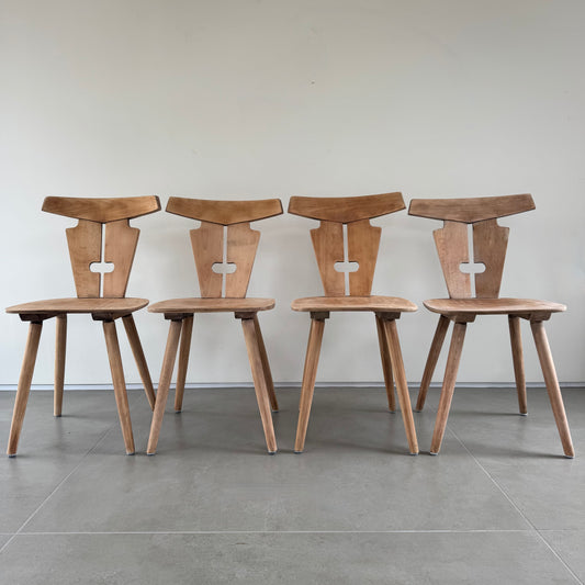 Four Brutalist folk design dining chairs