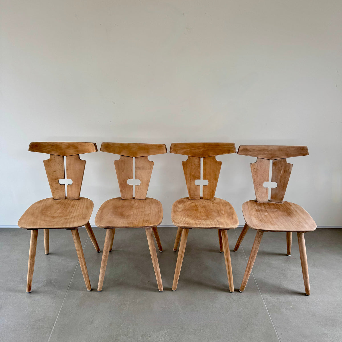 Four Brutalist folk design dining chairs