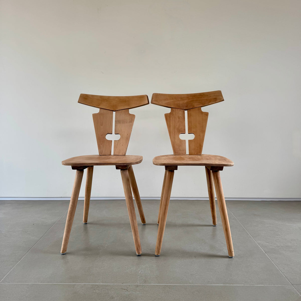 Four Brutalist folk design dining chairs
