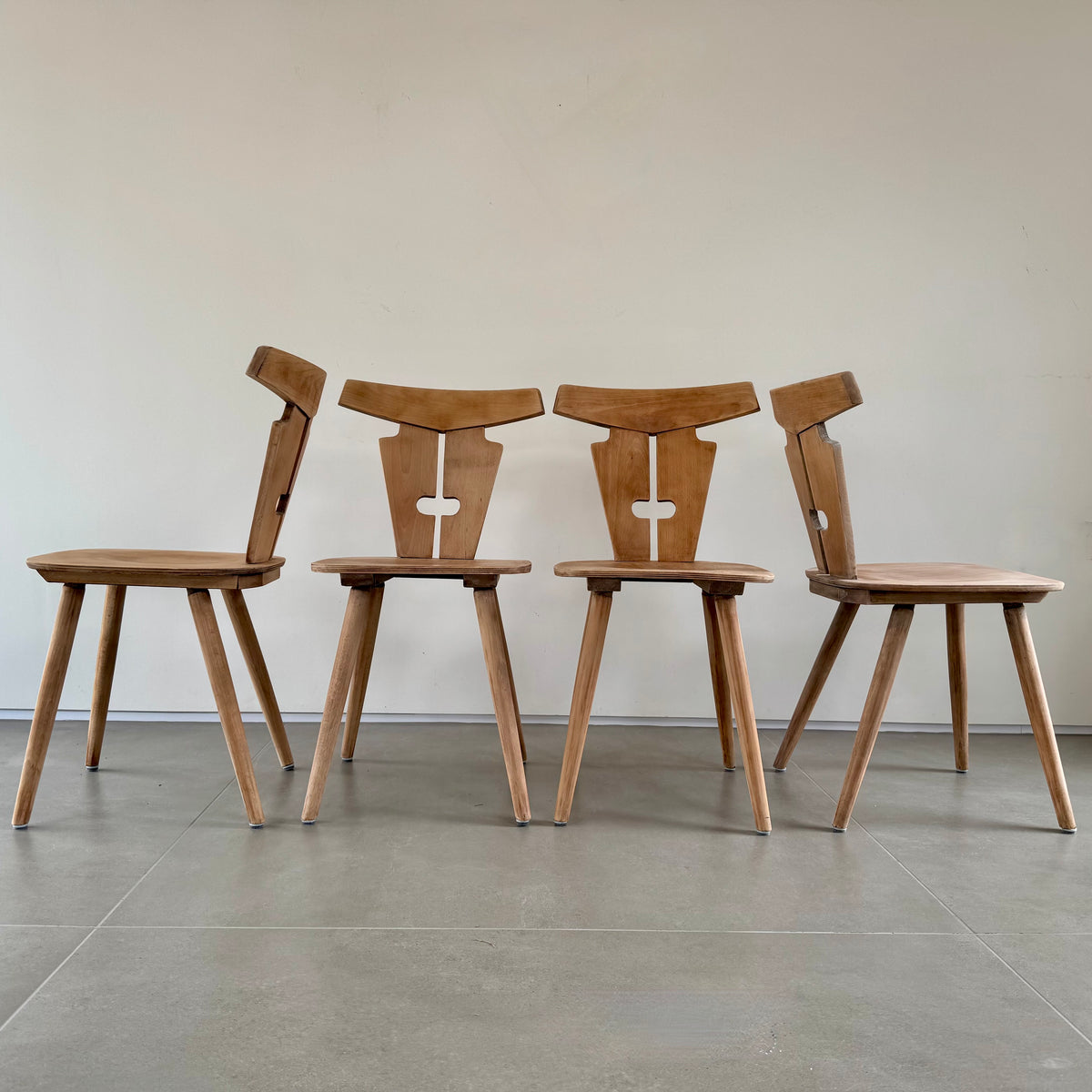 Four Brutalist folk design dining chairs