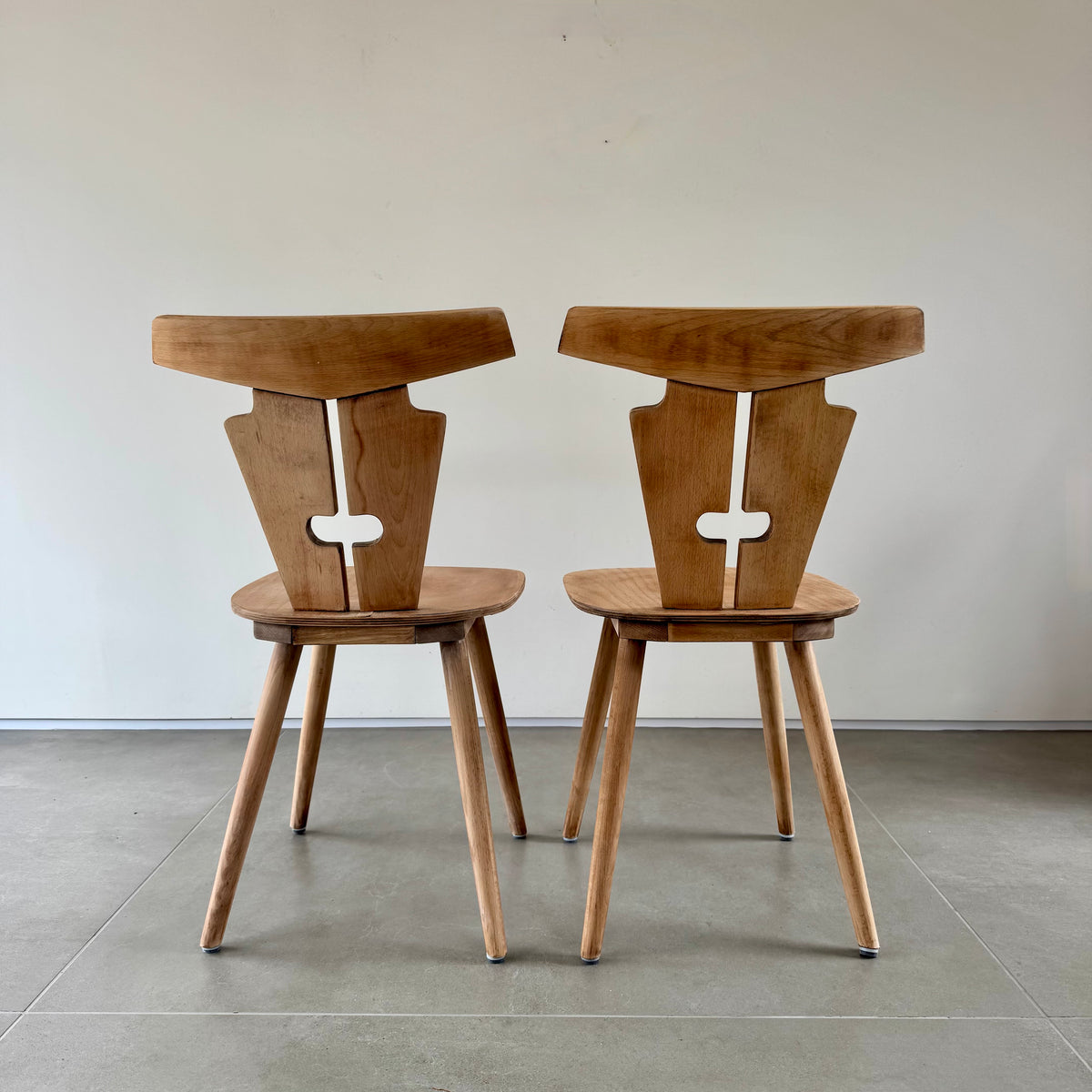 Four Brutalist folk design dining chairs